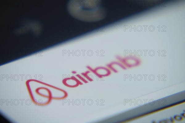 Dhaka, Bangladesh- 02 Dec 2025: A Close-up of a laptop screen is displaying the Airbnb web interface in a browser