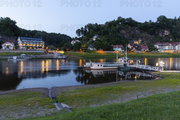Twilight view of the ferry across the Elbe in the spa town of Rathen, Saxon Switzerland, Saxony, Germany