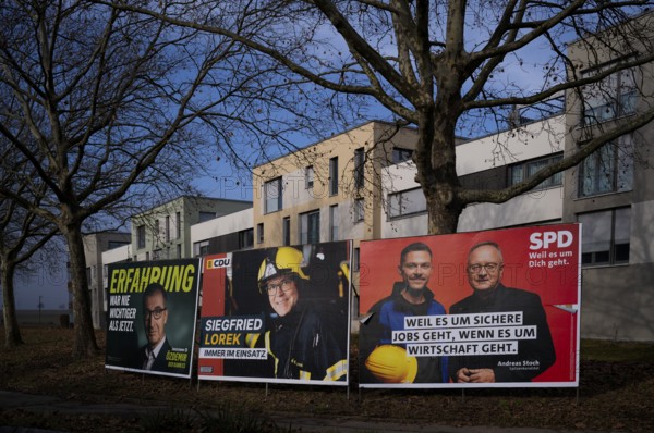 Candidates Cem Özdemir, Andreas Stoch, Siegfried Lorek in fire brigade uniform, the parties CDU, SPD, Alliance 90 Die Grünen, election poster, election posters, 2025 state election, Fellbach, Baden-Württemberg, Germany