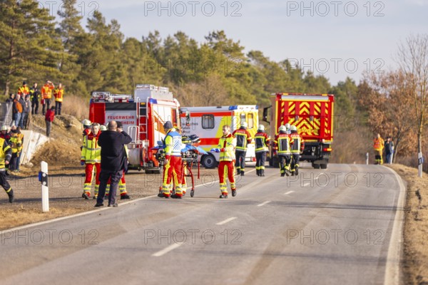 Accident on a country road, fire and emergency services on site with emergency vehicles, fire brigade exercise on the Hermann Hesse railway, Ostelsheim, Germany