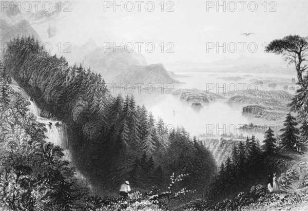 Torc waterfall with Muckross Lake, Killarney, County Kerry, Ireland, peaceful atmosphere, wild natural landscape, cataract, natural spectacle, coniferous forest, small islands, single tree, people, bird, landmark, steel engraving, 19th century, historical illustration from 1845