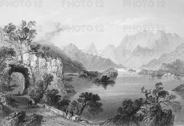 Lough Leane, Lake Leane, Killarney National Park, Killarney, County Kerry, Ireland, wild mountain landscape, lake, small rocky islands, country road, tunnel, walkers, idyll, sizen, solitude, quiet atmosphere, landmark, steel engraving, 19th century, historical illustration from 1845