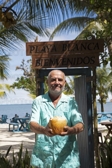 German manager, 67 years old, at Playa Blanca, Izabal Department, Guatemala