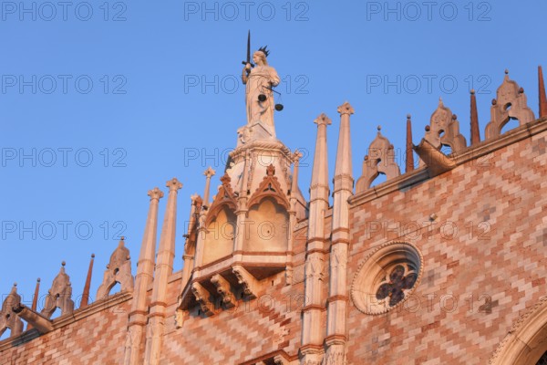 Doge's Palace, symbolic representation of jurisprudence, Justitia-Venetia with sword and scale, San Marco, Venice, Veneto, Italy