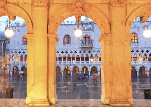 West façade of the Doge's Palace in the evening in rain, San Marco, Venice, Veneto, Italy