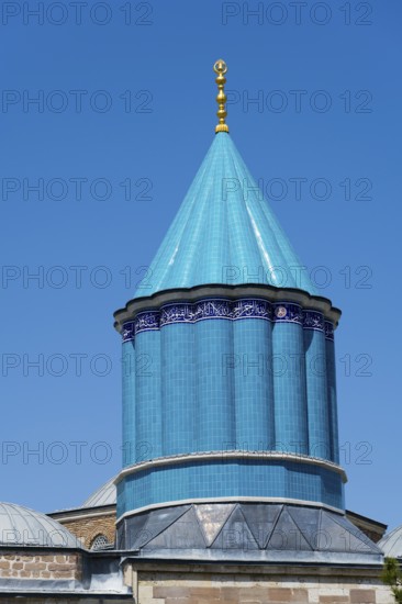 Detail of a turquoise dome in Islamic architecture under a blue sky, Mevlana Museum, Mevlana, landmark, mausoleum of Mevlânâ Jalal ad-Din Rumi, Konya, Central Anatolia, Turkey