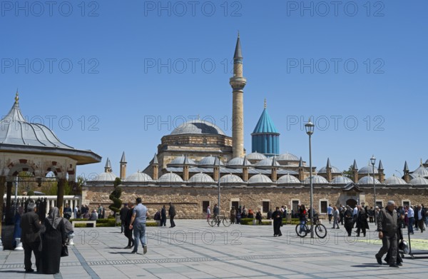 View of a mosque with several domes and minarets under a blue sky, Mevlana Museum, Mevlana, landmark, mausoleum of Mevlânâ Jalal ad-Din Rumi, Konya, Central Anatolia, Turkey
