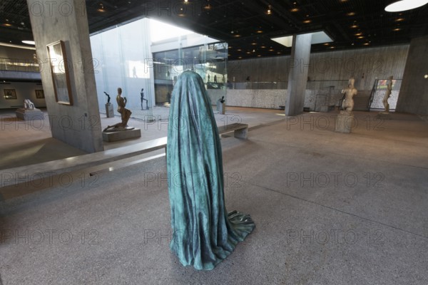 Statue of a veiled figure in the Lehmbruck Museum, self-portrait as a ghost by sculptor Alicja Kwade, Duisburg, North Rhine-Westphalia, Germany