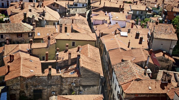 View over the rooftops of the old town of Koper with red tiles and narrow streets, Koper, Slovenia