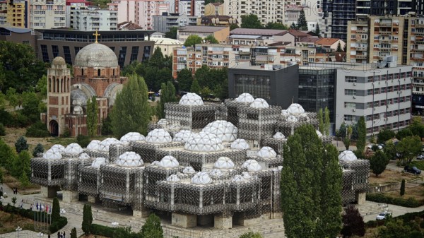 Unique building with domes in an urban environment, National Library, Pristina, Kosovo