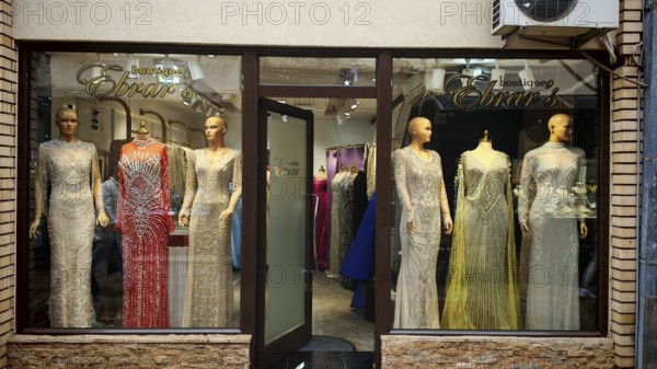 Elegant evening dresses in a boutique shop window, Ohrid, North Macedonia