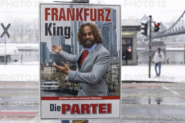 An election poster Fankfarz King - The Party hangs on a lamppost on the banks of the Main in Frankfurt. The Hessian state government has set March 15, 2026 as the election day for local elections in Hesse. On this day, the elections of the City Council and the 16 local advisory councils will take place in Frankfurt am Main, Germany
