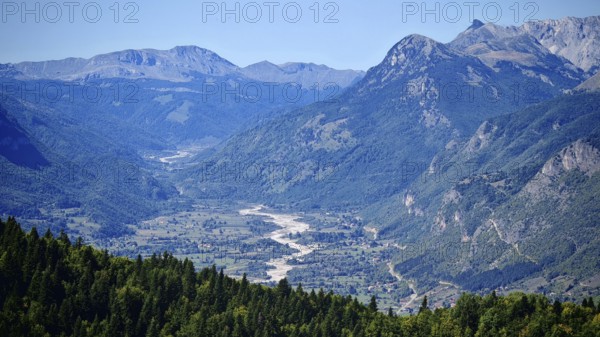 View of a mountain valley with a river surrounded by forests and mountains, Peaks of the Balkans, Montenegro