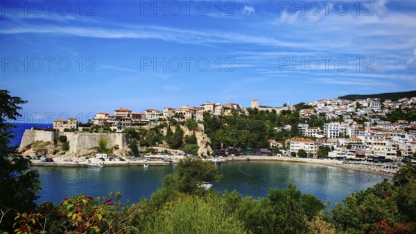 Panoramic view of coastal town with historic buildings and harbor, view of Ulcinj, Montenegro