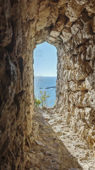 Rocky passageway overlooking the blue sea, peaceful and quiet atmosphere, Montenegro
