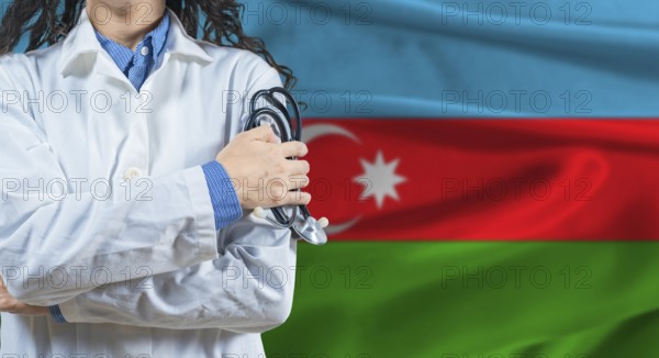 Healthcare professional with Azerbaijan flag background. Professional doctor holding stethoscope on Azerbaijan flag background