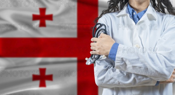 Healthcare professional with Georgia flag background. Professional doctor holding stethoscope on Georgia flag background