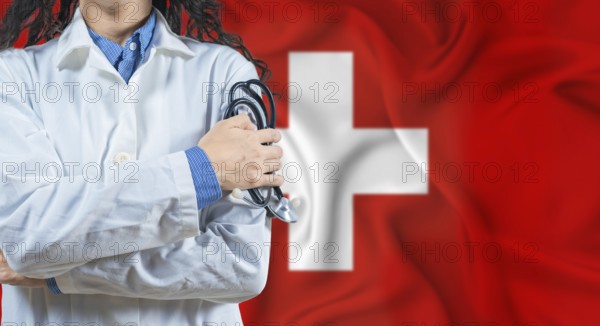 Healthcare professional with Switzerland flag background. Professional doctor holding stethoscope on Switzerland flag background