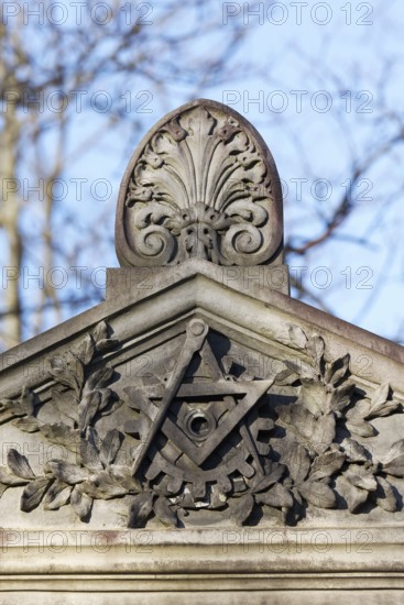 Circle, triangle and cog symbol, guild symbol for mechanical engineering at a burial site at the North Cemetery in Düsseldorf, North Rhine-Westphalia, Germany