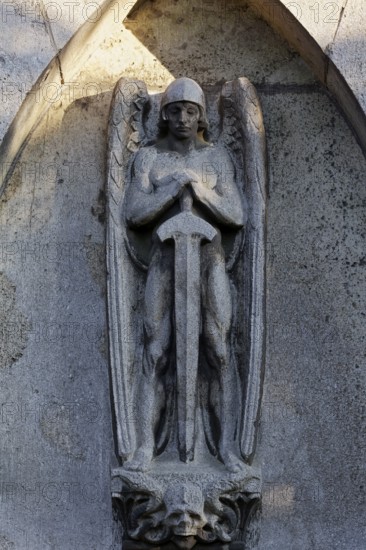 Saint Michael's grave relief with sword, detail of the Nourishing Mausoleum, Nordfriedhof Düsseldorf, North Rhine-Westphalia, Germany
