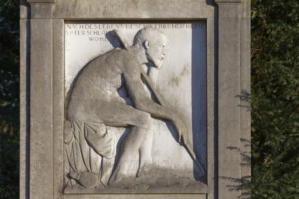 Grave relief old man with walking stick, Nordfriedhof Düsseldorf, North Rhine-Westphalia, Germany