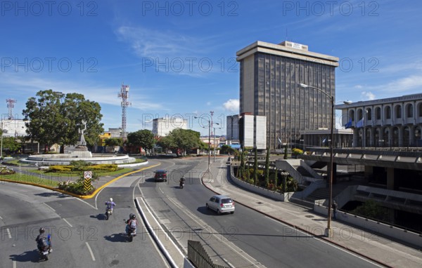Street scene in zone 14, on the left the Peace Memorial or Monumento a la Paz, Guatemala City, Guatemala Department, Guatemala