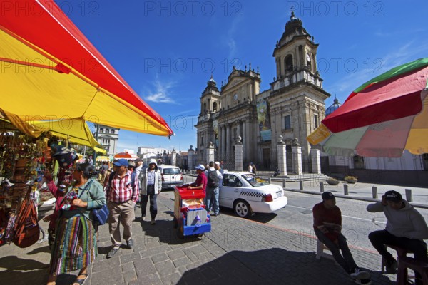Street scene in the old town zone 1, in the back the cathedral or Catedral Metropolitana de Santiago de Guatemala, Guatemala City, Guatemala Department
