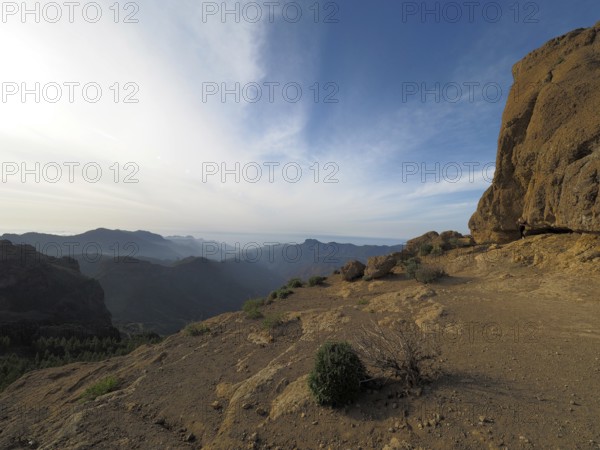 Wide, rocky landscape with views of distant mountains under blue sky, Roque Nublo, Gran Canaria, Canary Islands, Canary Islands, Spain