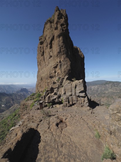 Steeply rising rock on a mountain trail with panoramic views, Roque Bentayga, Gran Canaria, Canary Islands, Spain