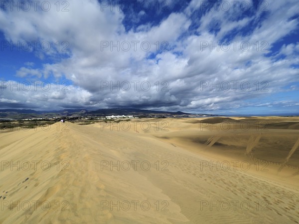 Wide sand dunes under a cloudy sky, Maspalomas Dunes, Gran Canaria, Canary Islands, Spain