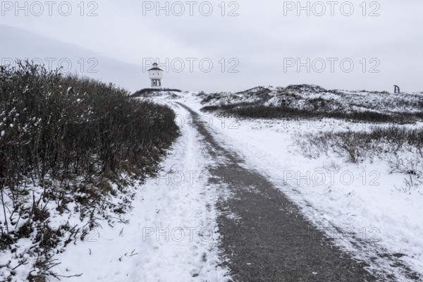 Water tower and dunes in snow, Langeoog, Lower Saxony, Germany