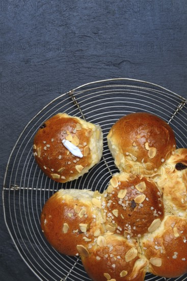 Epiphany cake with king on wire rack, Switzerland