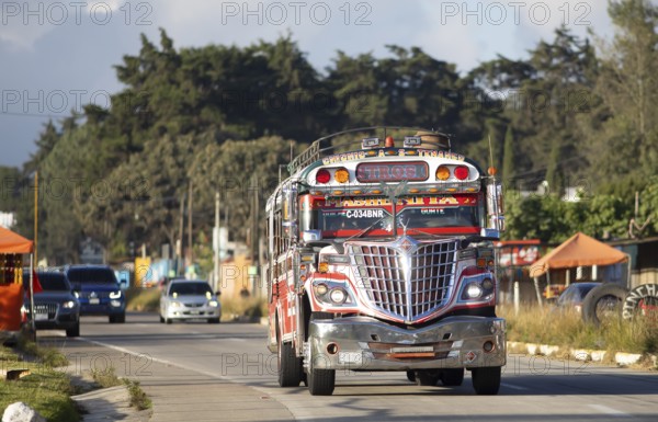 Colorful bus on the main street in Panajachel, Atitlán, Sololá Department, Guatemala