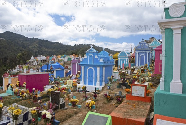 Colourful graves at the cemetery in Chichicastenango, Highlands, El Quiché Department, Guatemala