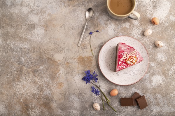Chocolate cake on brown concrete background, cup of coffee, top view, flat lay, copy space
