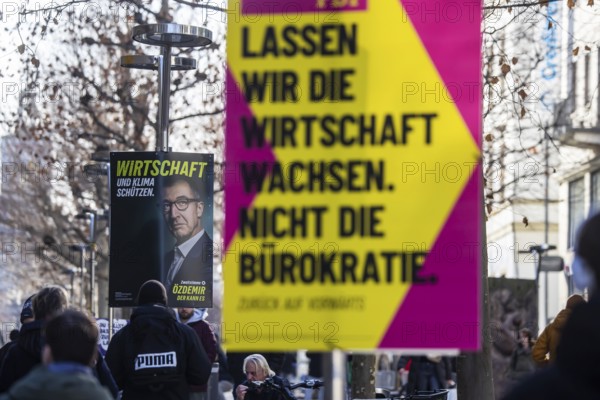 2026 state election in Baden-Württemberg. Election advertising in the city center of Stuttgart. FDP and GRÜNE rely on economic expertise. Top candidate Cem Özdemir. Stuttgart, Baden-Württemberg, Germany