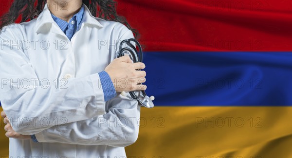 Healthcare professional with Armenia flag background. Professional doctor holding stethoscope on Armenia flag background
