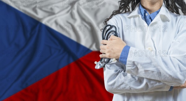Healthcare professional with Czech Republic flag background. Professional doctor holding stethoscope on Czech Republic flag background