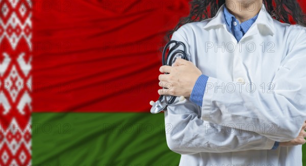 Healthcare professional with Belarus flag background. Professional doctor holding stethoscope on Belarus flag background