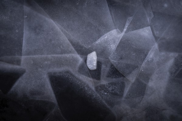 Ice sheets form abstract pattern on a frozen lake, ice, winter, Finland