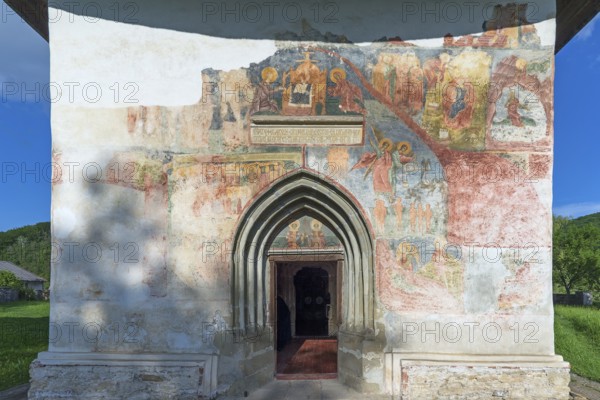 Exterior frescoes at the Church of the Exaltation of the Cross, Patrauti Moldavian monastery from the 15th century, Patrauti, Romania