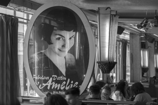 Poster at Café des Deux Moulins, filming location of the movie The Fabulous World of Amélie, 15 Rue Lepic, black and white, Paris, France