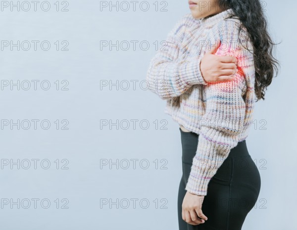 Female person with arm pain and muscle tension. Young woman with arm pain isolated