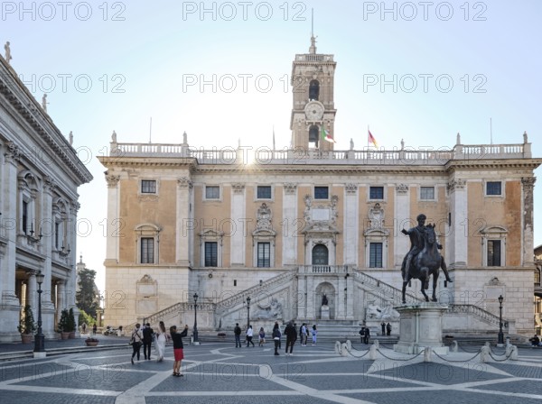 Equestrian statue of Marcus Aurelius in front of the Senatorial Palace (Palazzo Senatorio) in the morning light, Piazza del Campidoglio on the Capitoline Hill, Capitoline Square, Rome, Lazio, Italy