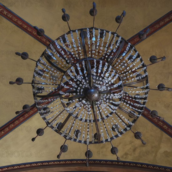 Detail of a luxurious chandelier on a decorated ceiling, Batumi, Georgia