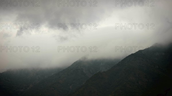 Cloudy and misty mountain landscape that creates a mysterious and calm image, Debed Canyon, Armenia