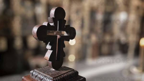 Close-up of an artfully designed wooden cross against a blurred background, North Macedonia
