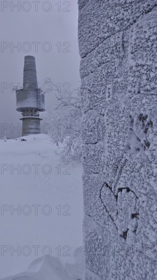 Snowy landscape with a tower and a heart drawn in frost on a wall, Backöfele, Schneeberg, Fichtelgebirge, Bavaria