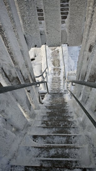 Snowy, icy staircase offers interesting perspective and structural details, Schneeberg, Fichtelgebirge, Bavaria