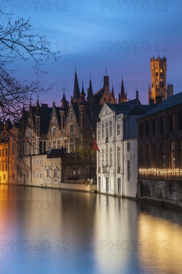 Bruges. Belgium. Flanders. Houses in the historic district overlooking a canal. UNESCO